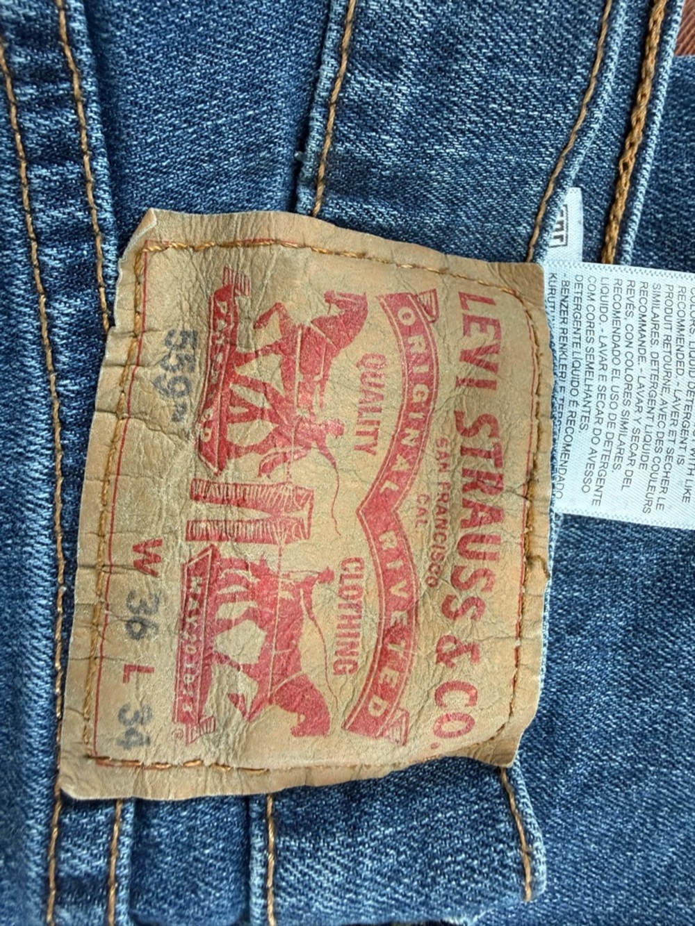 Levi's Relaxed Fit Denim Jeans in Mid Blue with Tan Patch